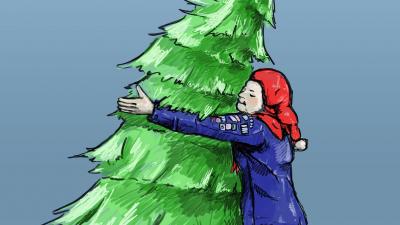 Spejder krammer juletræ