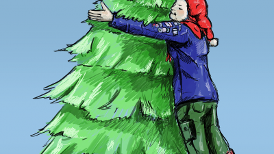 Spejder krammer et juletræ